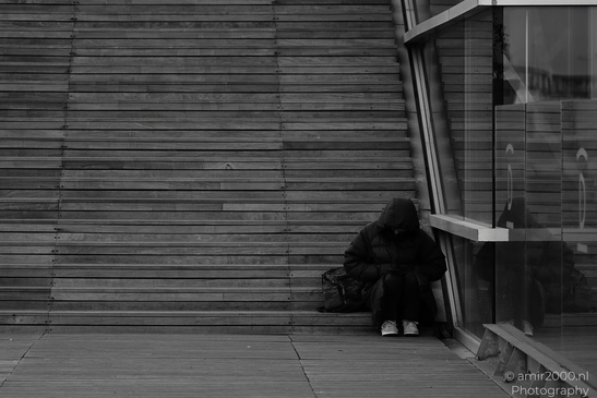 Person_Sitting_Alone_In_Black_And_White_Amsterdam_Netherlands_People_Creative_Collection_Photography_Canon_EOS_R5_Mark_II_2026_001.JPG