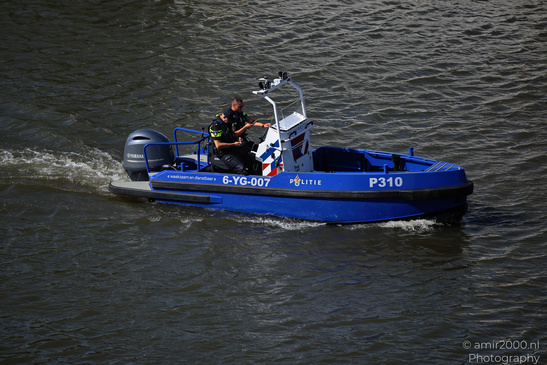 Police_Boat_In_The_Canals_Of_Amsterdam_Netherlands_People_Creative_Collection_Photography_Canon_EOS_R5_Mark_II_2026_001.JPG
