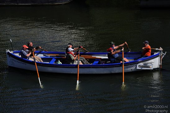 Rowers_In_Boat_In_The_Canals_Of_Amsterdam_Netherlands_People_Creative_Collection_Photography_Canon_EOS_R5_Mark_II_2026_001.JPG