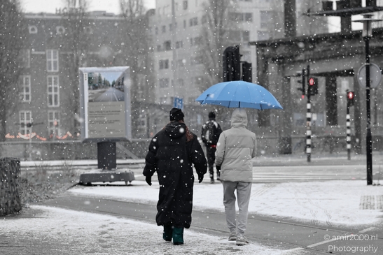 Snowy_Cityscape_With_Pedestrians_And_Umbrellas_Amsterdam_Netherlands_People_Creative_Collection_Photography_Canon_EOS_R5_Mark_II_2026_002.JPG
