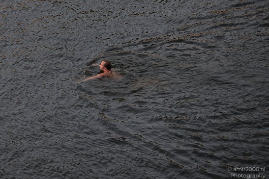 Swimmer_In_Canal_Amsterdam_Netherlands_People_Creative_Collection_Photography_Canon_EOS_R5_Mark_II_2026_002.JPG