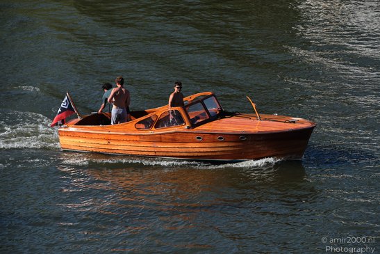 Wooden_Boat_On_Canal_Amsterdam_Netherlands_People_Creative_Collection_Photography_Canon_EOS_R5_Mark_II_2026_001.JPG