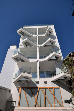 Modern Building Facade shows built forms and structural lines. - image from year 2026 #001
