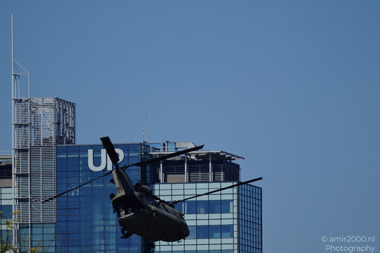 Boeing CH-47 Chinook of the Royal Netherlands Air Force flying over Amsterdam with twin rotors - image from year 2026 #001