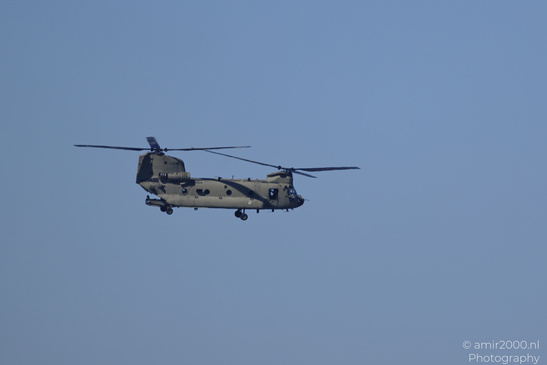 Boeing CH-47 Chinook of the Royal Netherlands Air Force flying over Amsterdam with twin rotors - image from year 2026 #006