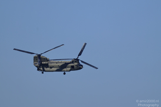 Boeing CH-47 Chinook of the Royal Netherlands Air Force passing above the city with its tandem - image from year 2026 #007
