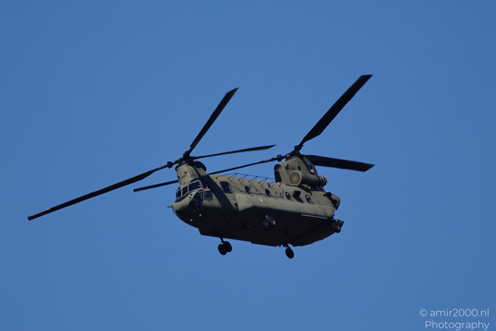 Boeing CH-47 Chinook of the Royal Netherlands Air Force flying over Amsterdam with twin rotors - image from year 2026 #011