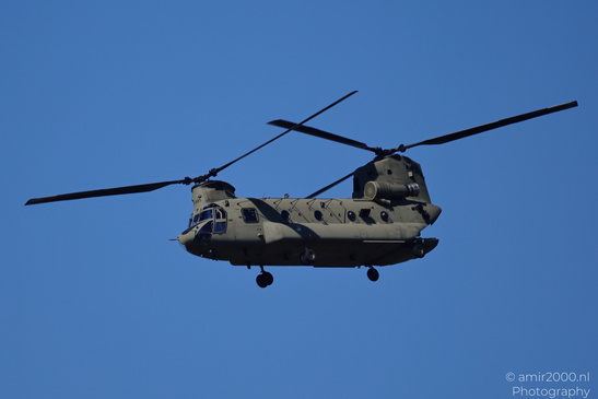 Boeing CH-47 Chinook of the Royal Netherlands Air Force passing above the city with its tandem - image from year 2026 #012