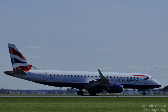 A British Airways aircraft on a runway with its landing gear deployed and a clear sky above in - image from year 2026 #005