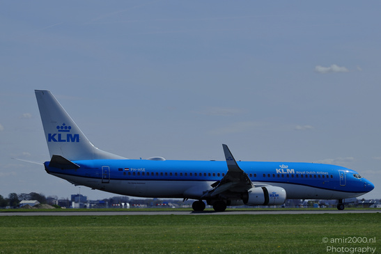 A KLM Royal Dutch Airlines aircraft is positioned on an airport runway with a clear sky and - image from year 2026 #004