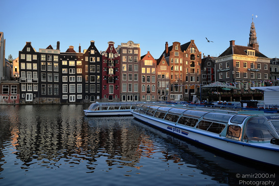 Damrak_Canal_Houses_At_Golden_Hour_Amsterdam_Netherlands_Cityscape_Photography_Canon_EOS_R5_Mark_II_2026_003.JPG