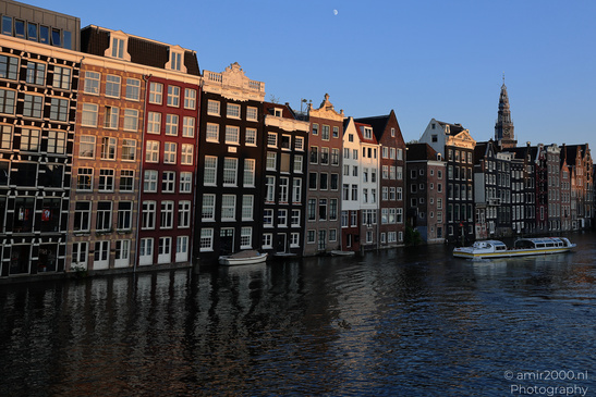 Damrak_Canal_Houses_At_Golden_Hour_Amsterdam_Netherlands_Cityscape_Photography_Canon_EOS_R5_Mark_II_2026_009.JPG