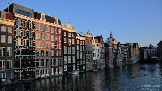 Damrak_Canal_Houses_At_Golden_Hour_Amsterdam_Netherlands_Cityscape_Photography_Canon_EOS_R5_Mark_II_2026_010.JPG