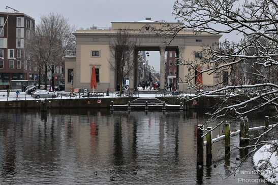 Haarlemmerplein_And_Canal_In_Snowy_Day_Amsterdam_Netherlands_Cityscape_Photography_Canon_EOS_R5_Mark_II_2026_001.JPG
