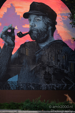 Mural_Of_Man_Smoking_Pipe_In_Nieuwe_Foeliestraat_Amsterdam_Netherlands_Cityscape_Photography_Canon_EOS_R5_Mark_II_2026_001.JPG