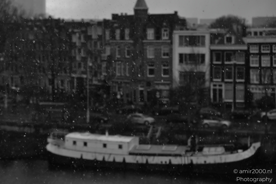 Snowfall_Black_And_White_Amsterdam_Netherlands_Cityscape_Photography_Canon_EOS_R5_Mark_II_2026_001.JPG