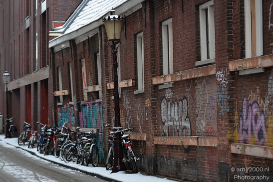 Snowy_Bikes_And_Urban_Artwork_Amsterdam_Netherlands_Cityscape_Photography_Canon_EOS_R5_Mark_II_2026_003.JPG