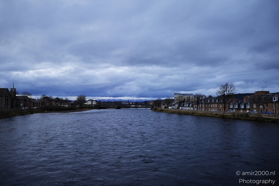 Scottish City Inverness a river flows through a town under an overcast sky. - image from year 2026 #026