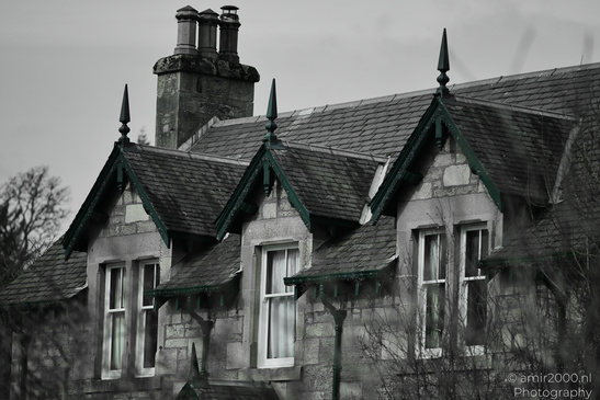 Town Pitlochry a gothic style house with a tall chimney and pointed roof gables. - image from year 2026 #010