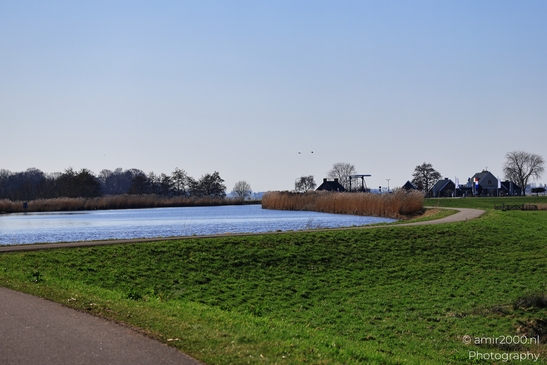 Visible water surface and reeds in the background in Ouderkerk aan de Amstel, Netherlands. - image from year 2026 #008
