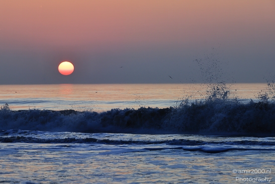 Sunset over the North Sea with waves breaking near the shore. - image from year 2026 #014