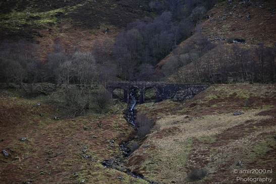 A bridge spanning a stream appears in Scotland United Kingdom. - image from year 2026 #017