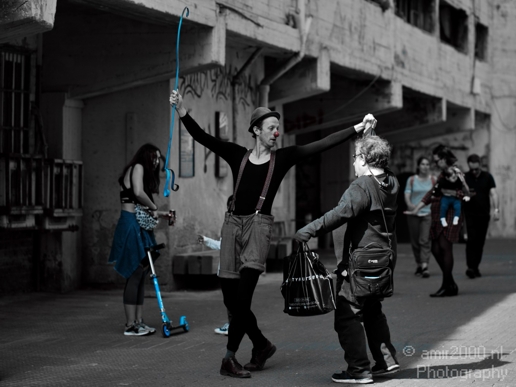 A_clown_dances_with_a_man_around_Jaffa_port_Tel_Aviv-jaffa_Israel_Canon_EOS_5D_Mark_IV.JPG
