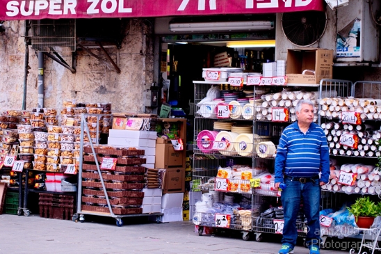 A_man_outside_a_store_in_Machane_Yehuda_market_Jerusalem_Israel_Canon_EOS_5D_Mark_IV.JPG