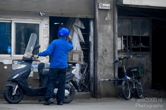 A_person_with_a_vespa_Tel_Aviv-jaffa_Israel_Canon_EOS_5D_Mark_IV.JPG