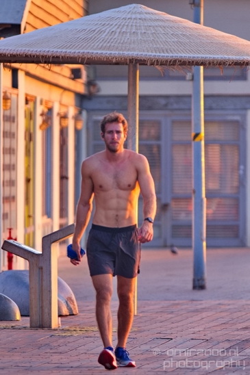 A_shirtless_muscular_guy_walks_in_Tel_Aviv_promenade_Tel_Aviv-jaffa_Israel_Canon_EOS_5D_Mark_IV.JPG