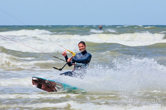A_wind_surfer_smiling_to_the_camera_during_th_action_North_Sea_Netherlands_Canon_EOS_5D_Mark_IV.JPG