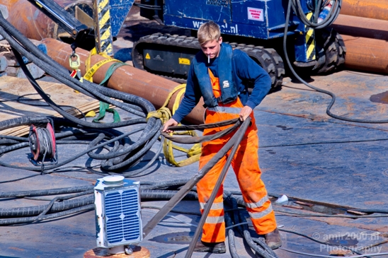 Dutch_worker_smoking_wearing_orange_jumpsuit_during_work_Amsterdam_Netherlands_Canon_EOS_5D_Mark_IV.JPG