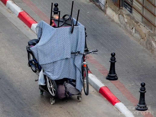 Homeless_pushes_around_his_belognings_Tel_Aviv-jaffa_Israel_Canon_EOS_5D_Mark_IV.JPG