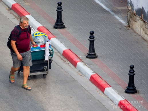 Homeless_walks_around_with_his_belognings_Tel_Aviv-jaffa_Israel_Canon_EOS_5D_Mark_IV.JPG