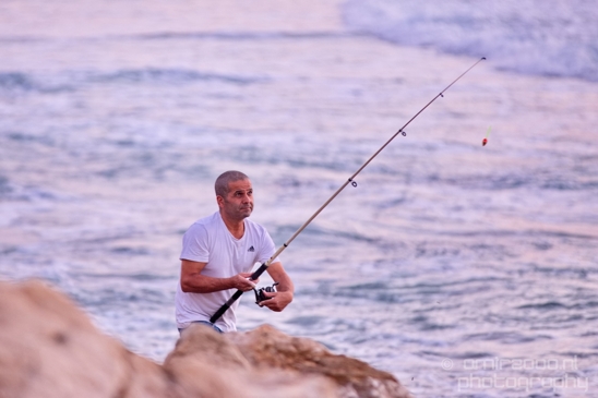 fisherman_in_mediterranean_sea_Tel_Aviv-jaffa_Israel_Canon_EOS_5D_Mark_IV.JPG