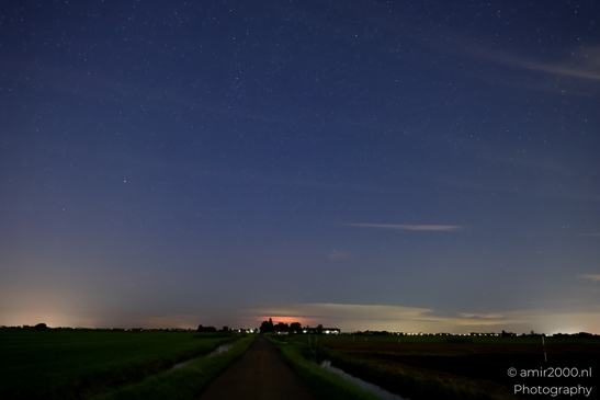 A starry night sky over a rural landscape in Noord-Holland, Netherlands in Noord-Holland - image from year 2025 #030